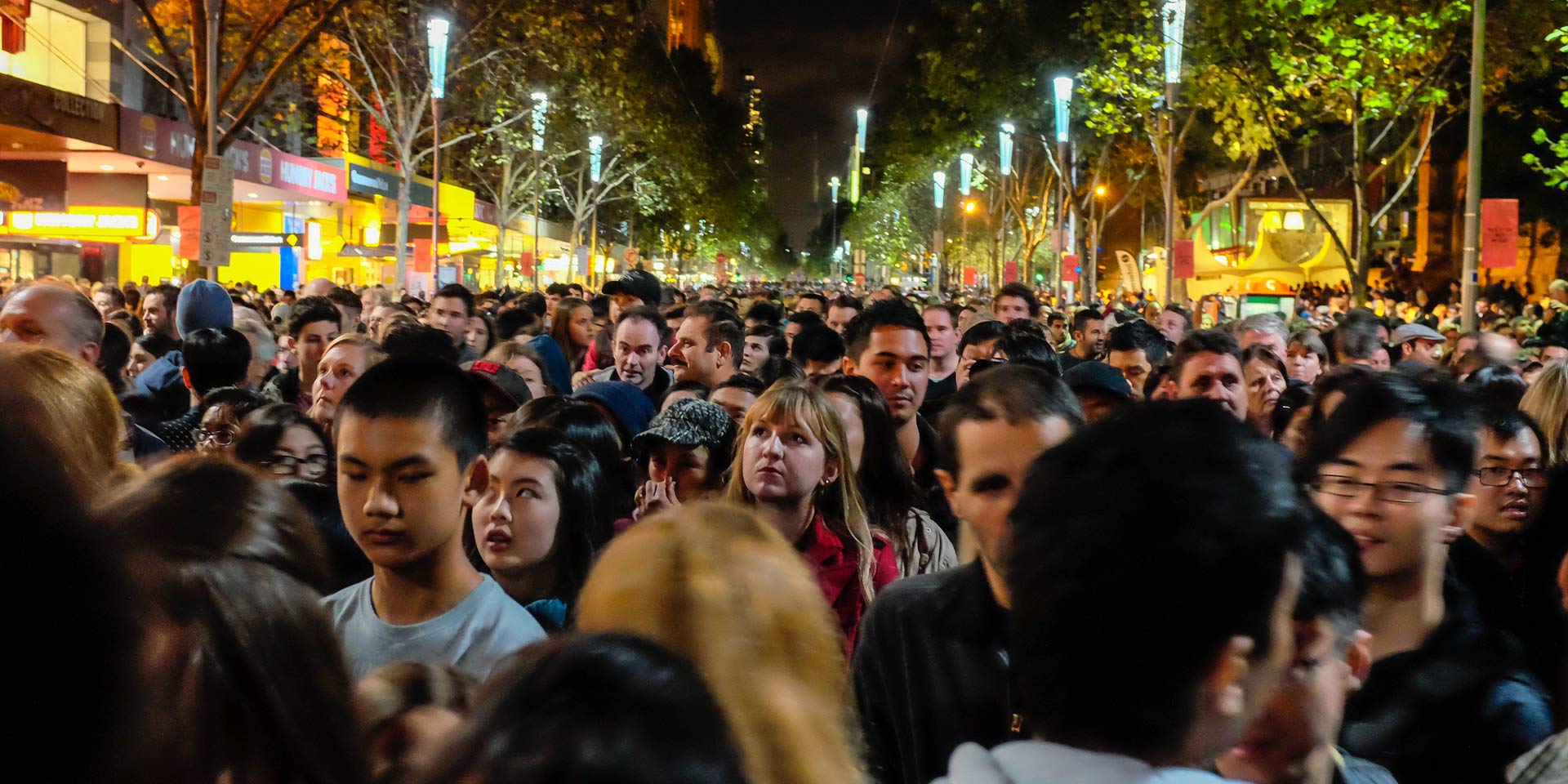 Multicultural crowd of people in motion