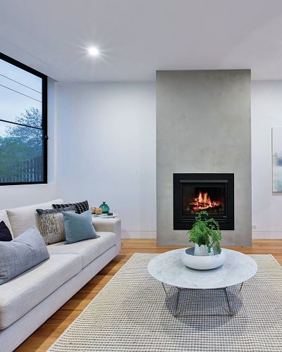 Clean and modern living room with fireplace