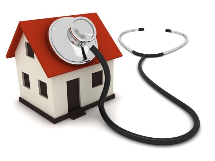 Stethoscope listening to a house